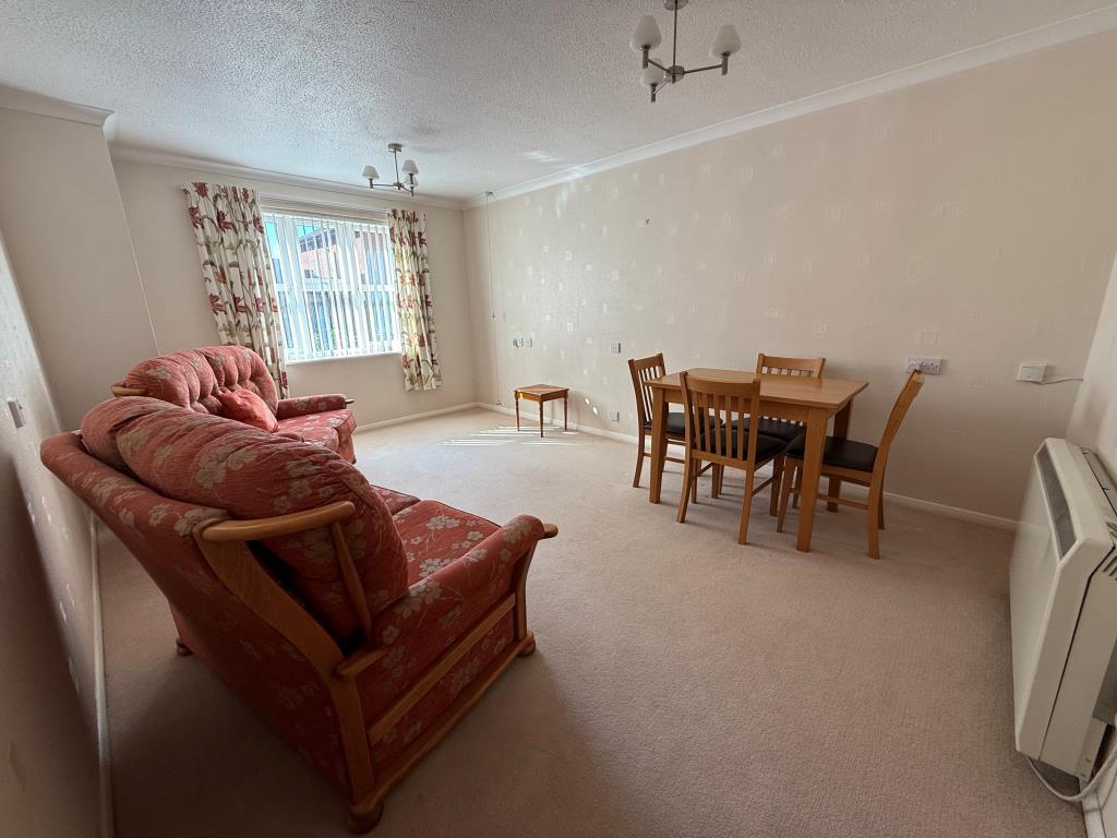 Living room with window to the left side