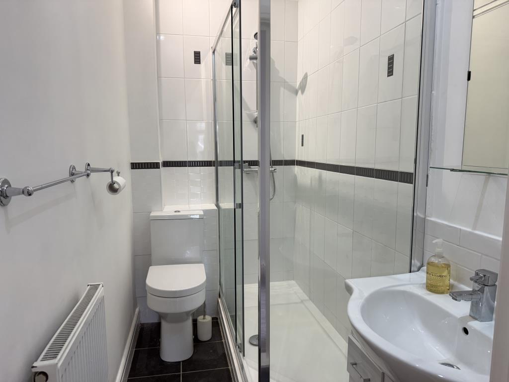 Shower room with white suite