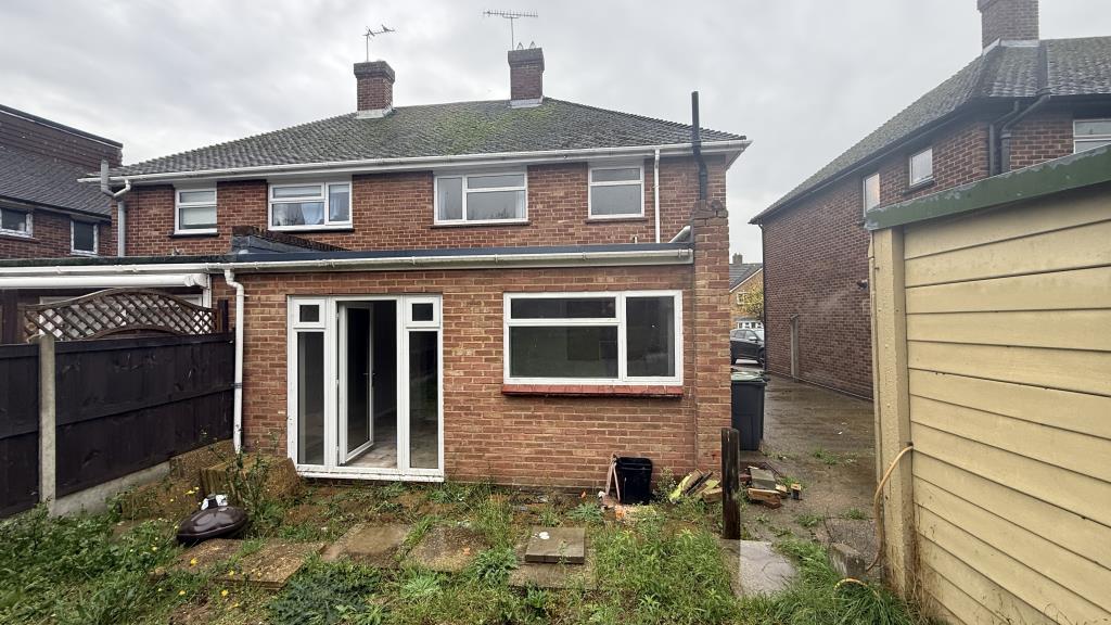 External image of house with extension from garden
