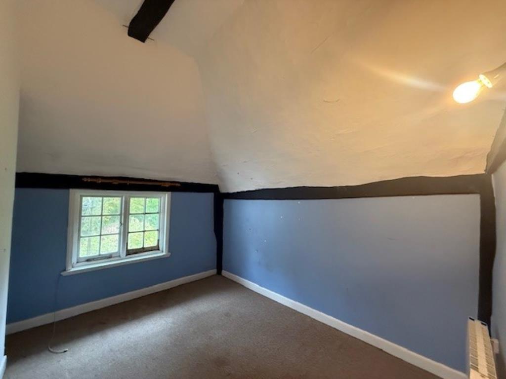 50 Abbey Street bedroom two with window and vaulte