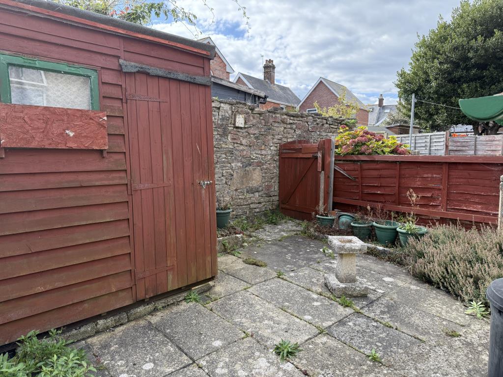 Garden with brick wall and fence boundary