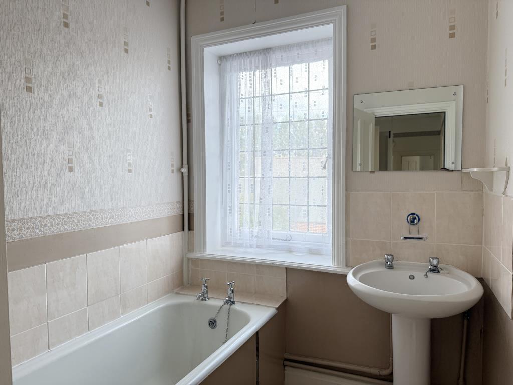 Bathroom with white suite