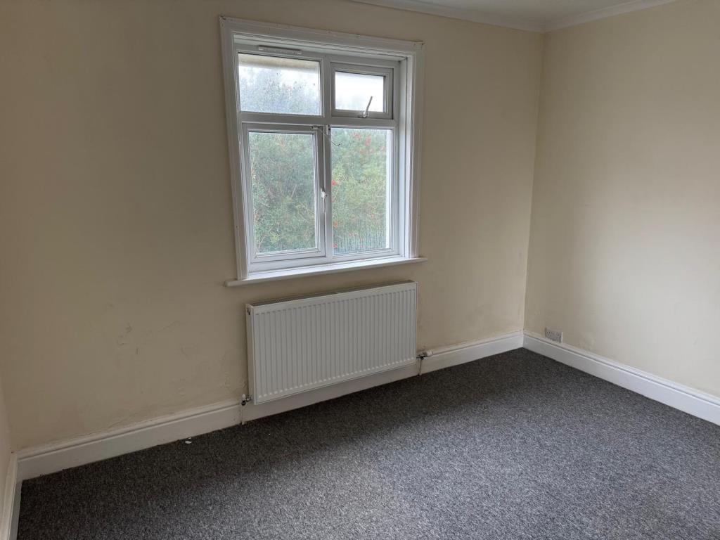 Main bedroom with carpet and magnolia wall