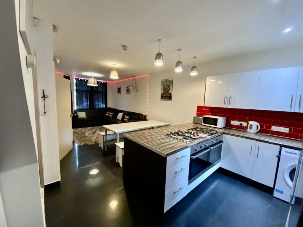 Bright, open-plan living space with a modern ki...