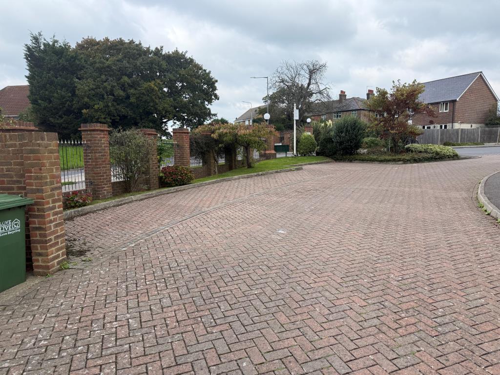 Parking spaces to left of chapel