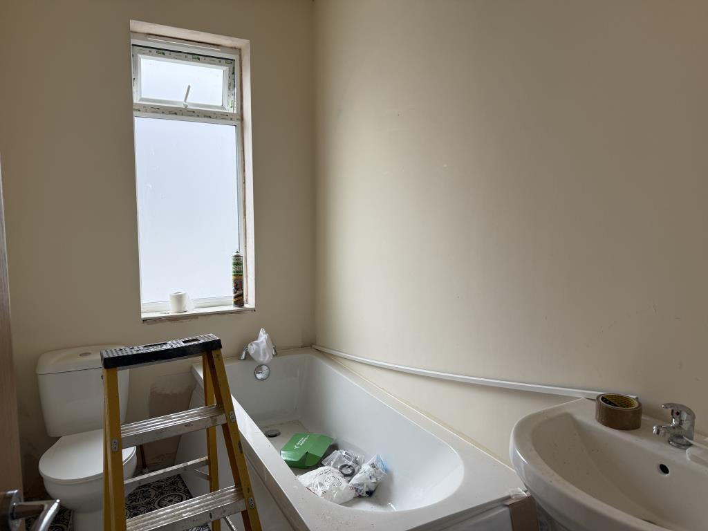 Bathroom with white suite