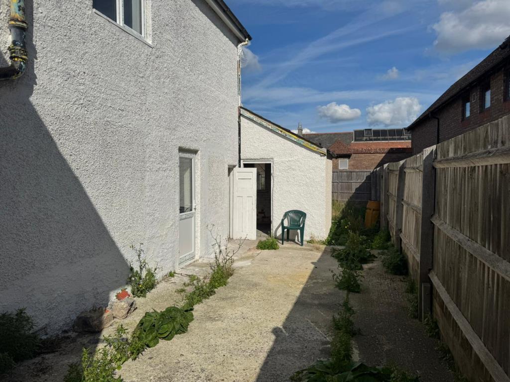Side view of building and patio area