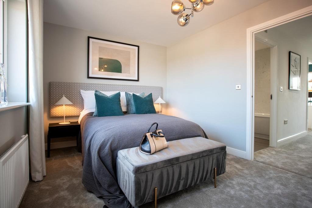 A second double bedroom overlooks the garden
