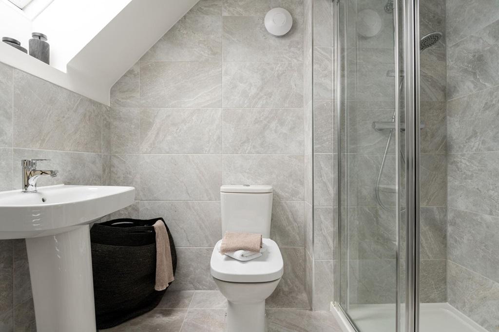 An en-suite shower room away from the family
