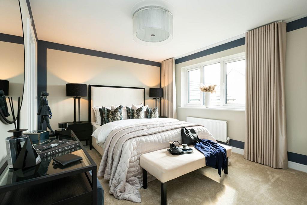 Grand main bedroom which overlooks the rear garden