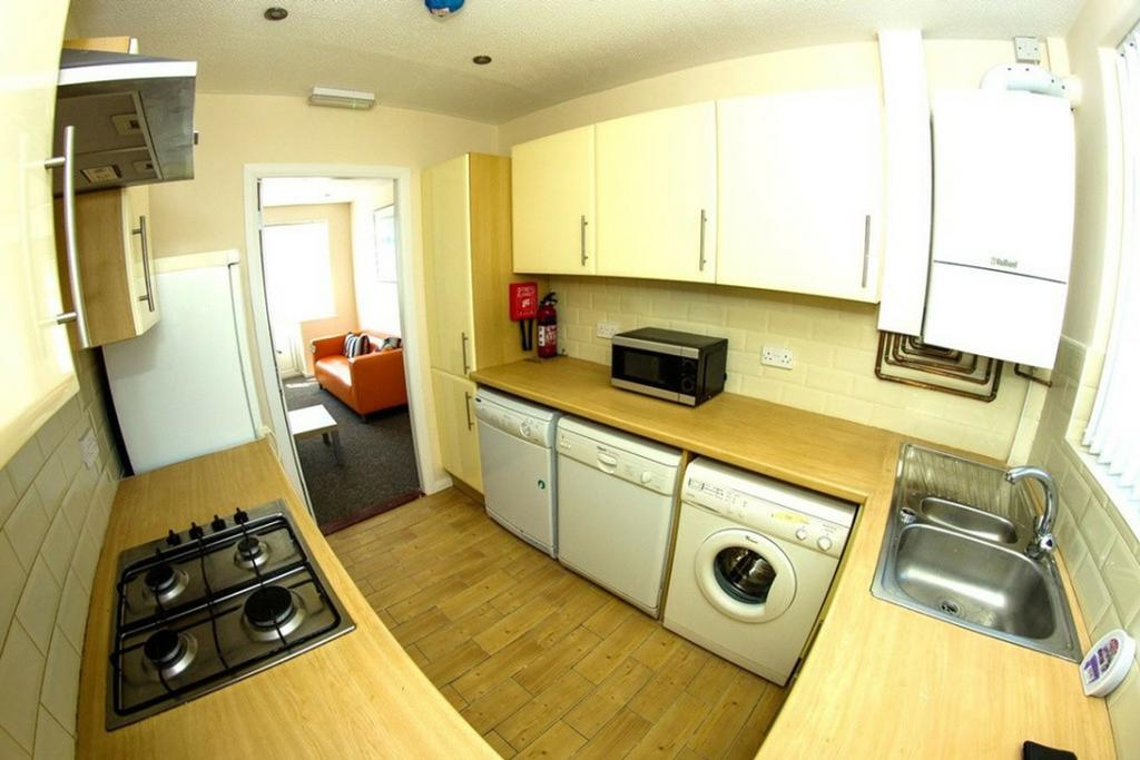 A bright and functional kitchenette with modern...