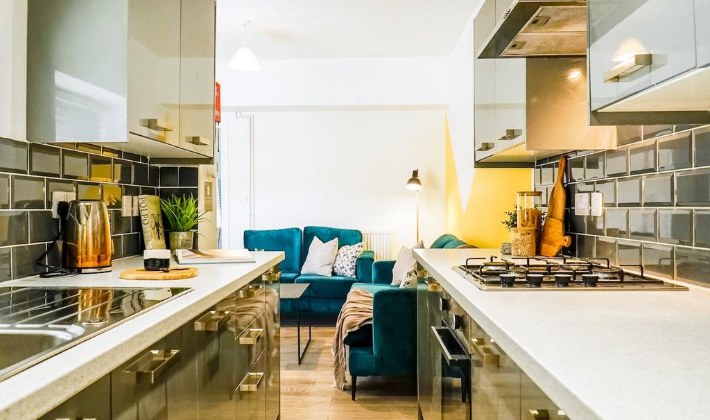 Bright and modern kitchen with ample countertop...