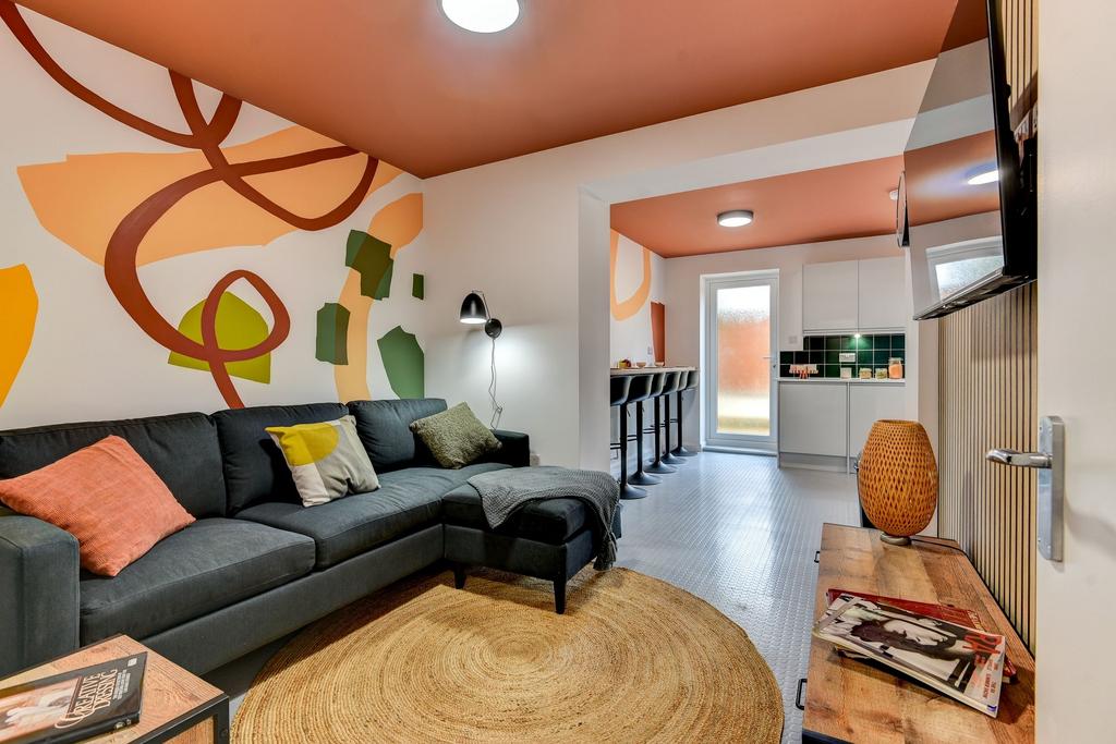 Contemporary open-plan living area with a comfo...