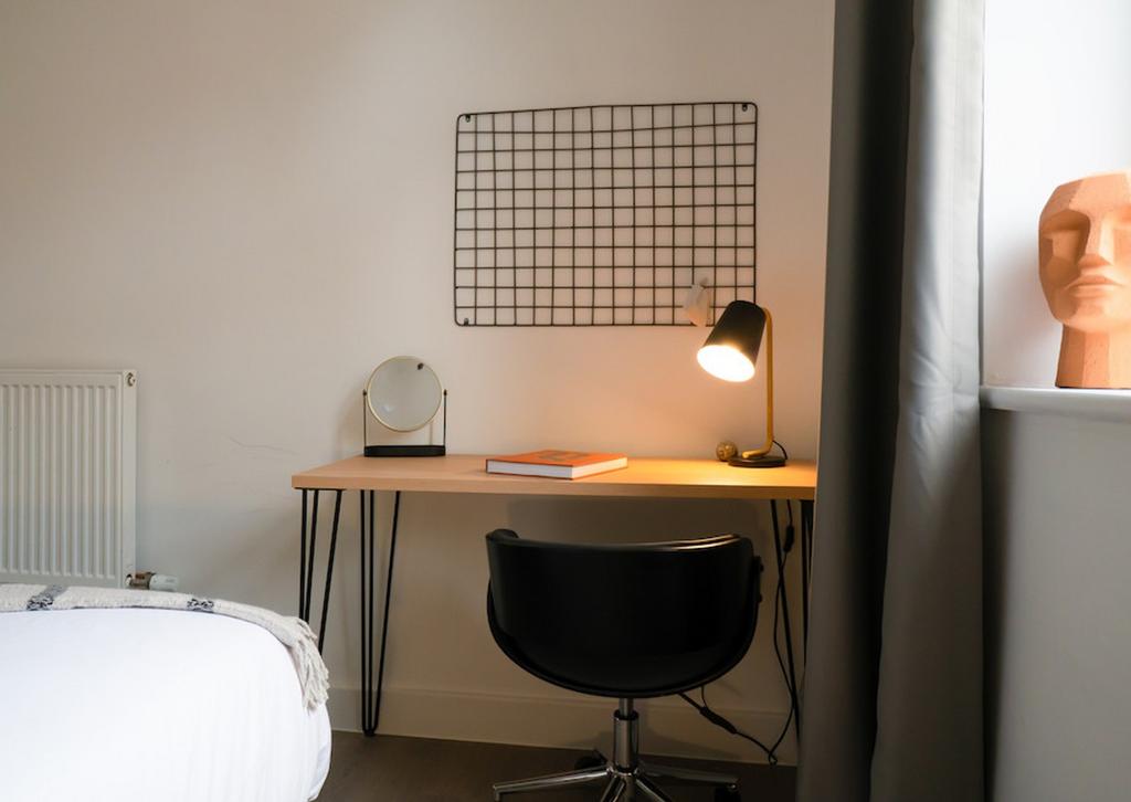 A stylish and well-organized double bedroom fea...