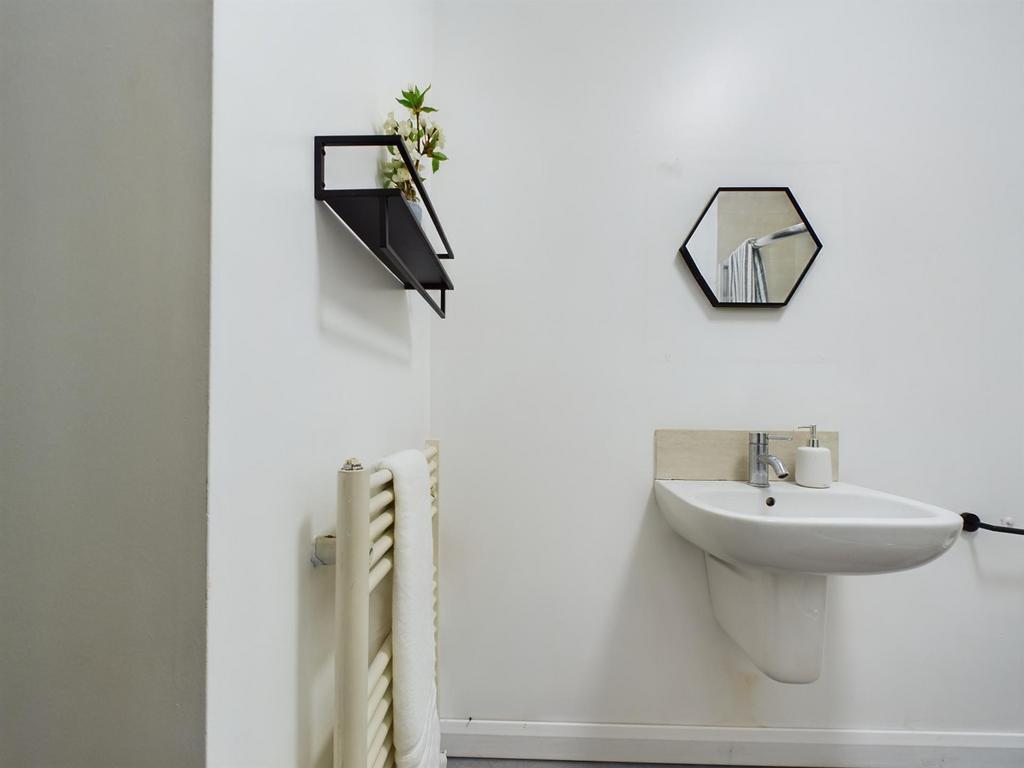 A modern and clean bathroom featuring stylish d...