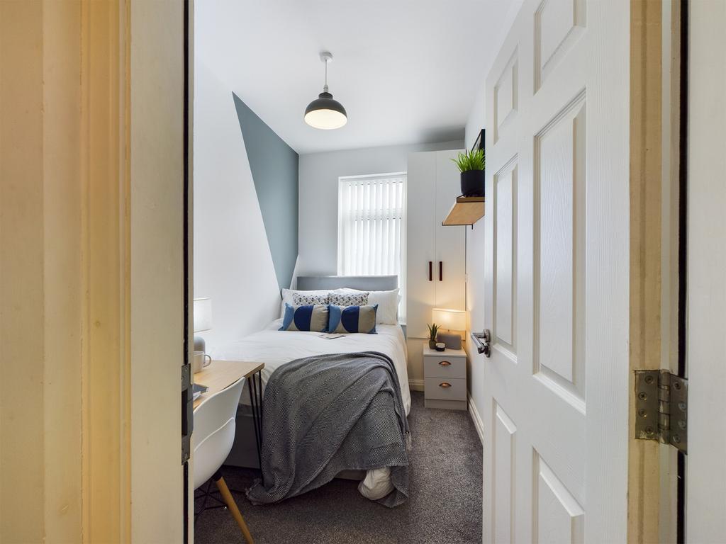 A bright and inviting double bedroom, perfect f...