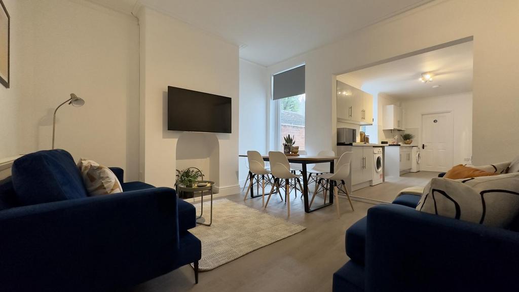 A stylish and spacious modern living room with ...