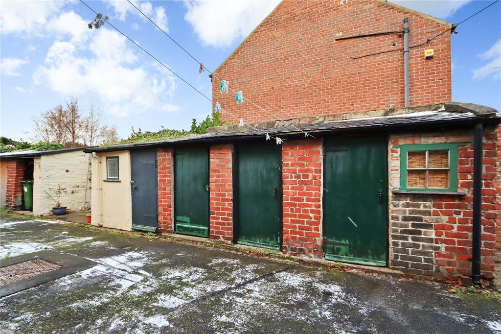 Three Outhouses