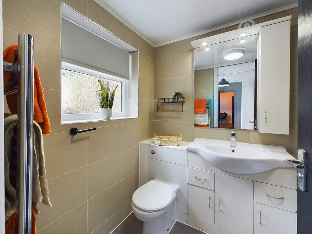 A modern and well-maintained bathroom featuring...