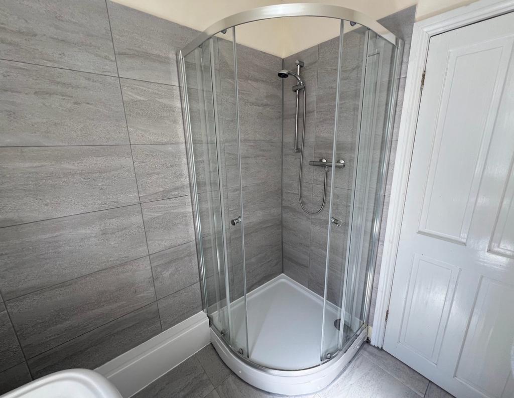 A modern and clean bathroom featuring a stylish...