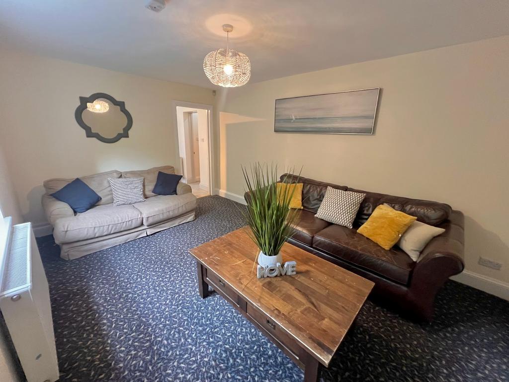 A spacious and inviting living room perfect for...