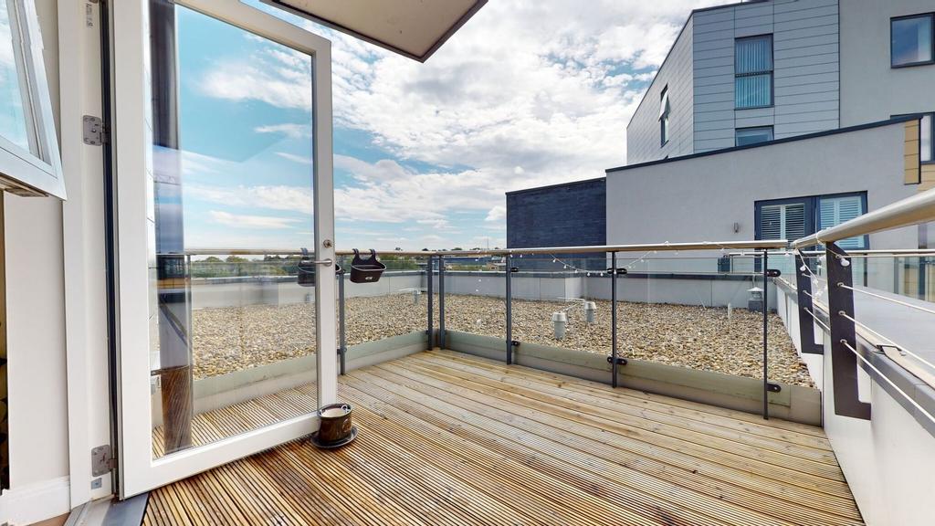Bright private rooftop terrace with timber deck...