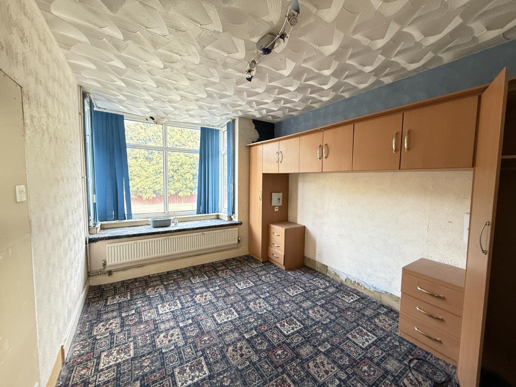 Bedroom one with bay window