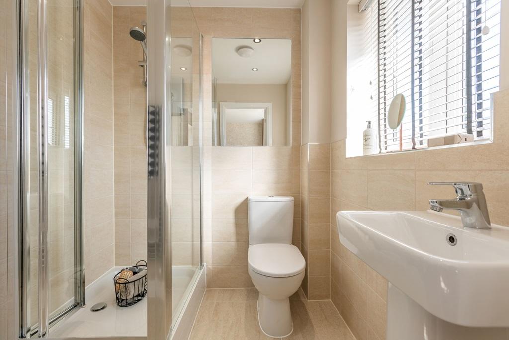 A peaceful en suite shower room designed for...