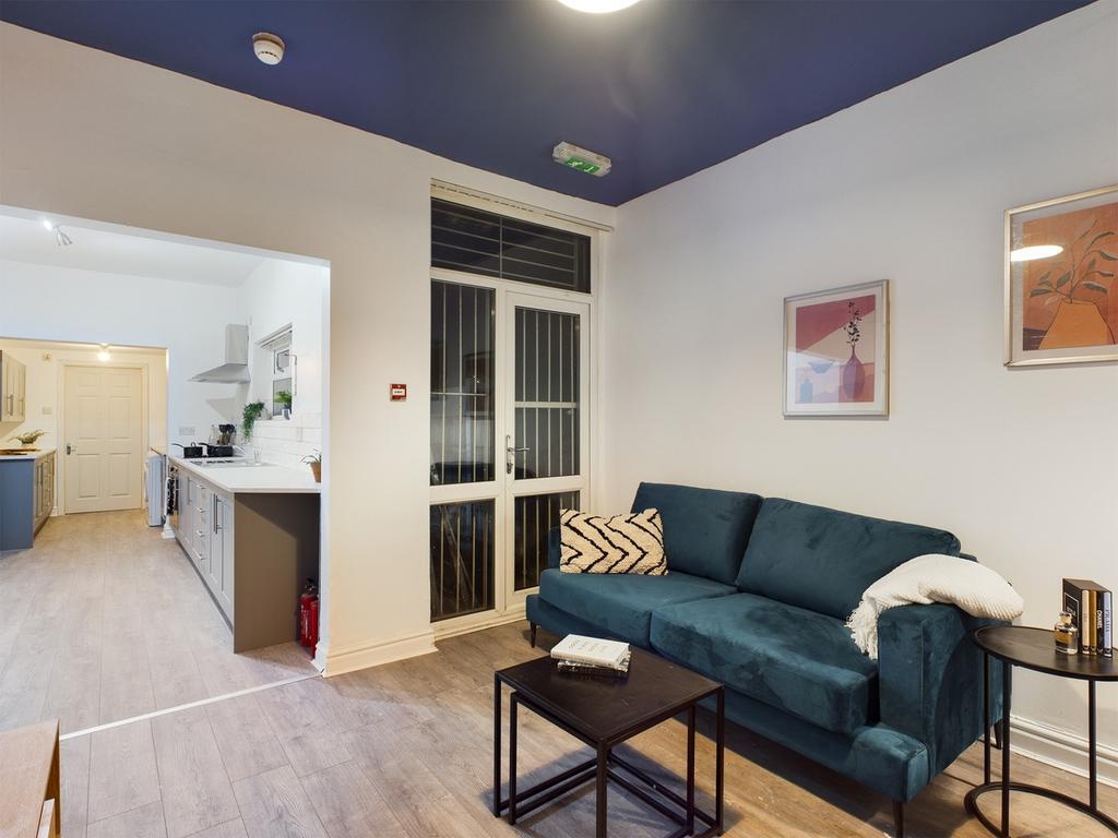 A spacious and stylish modern living room perfe...