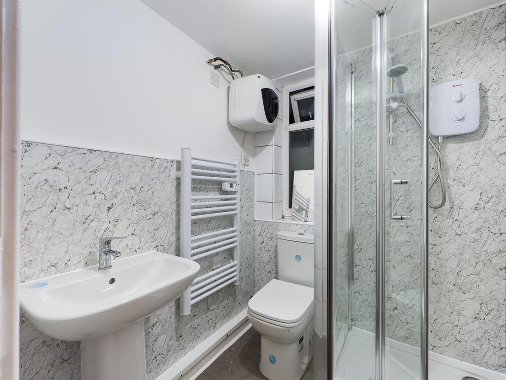 A modern and clean bathroom featuring a stylish...