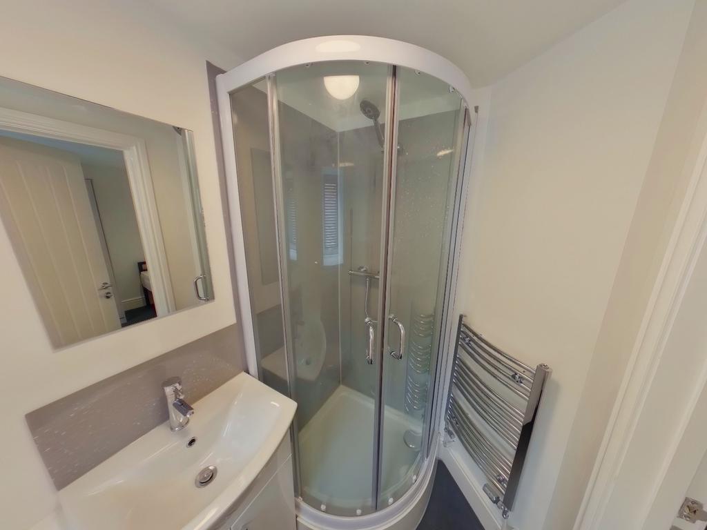 A modern and clean bathroom featuring a stylish...
