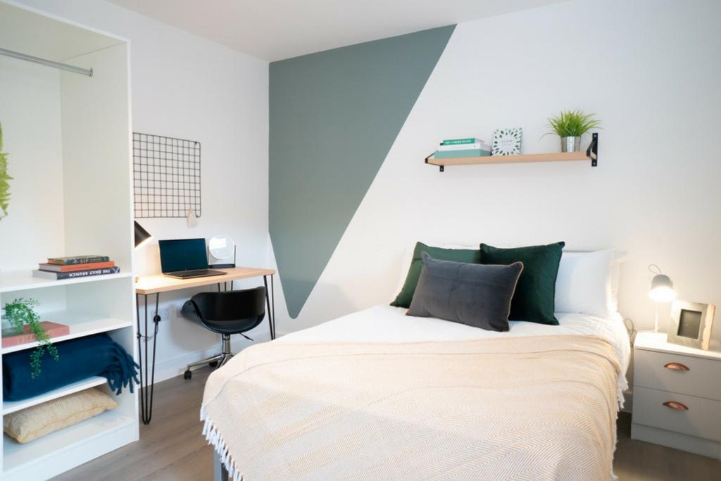 A beautifully designed double bedroom featuring...