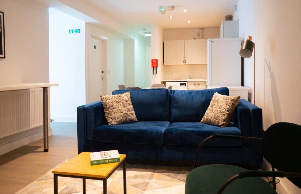 A spacious and inviting modern living room, per...