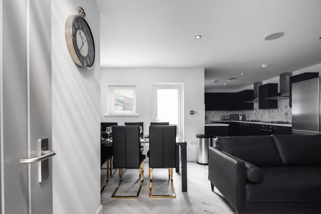 Modern and stylish living area featuring a comf...