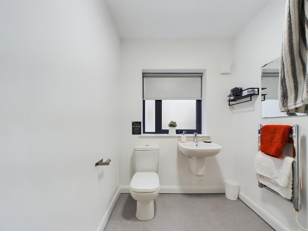A modern and clean bathroom featuring a stylish...