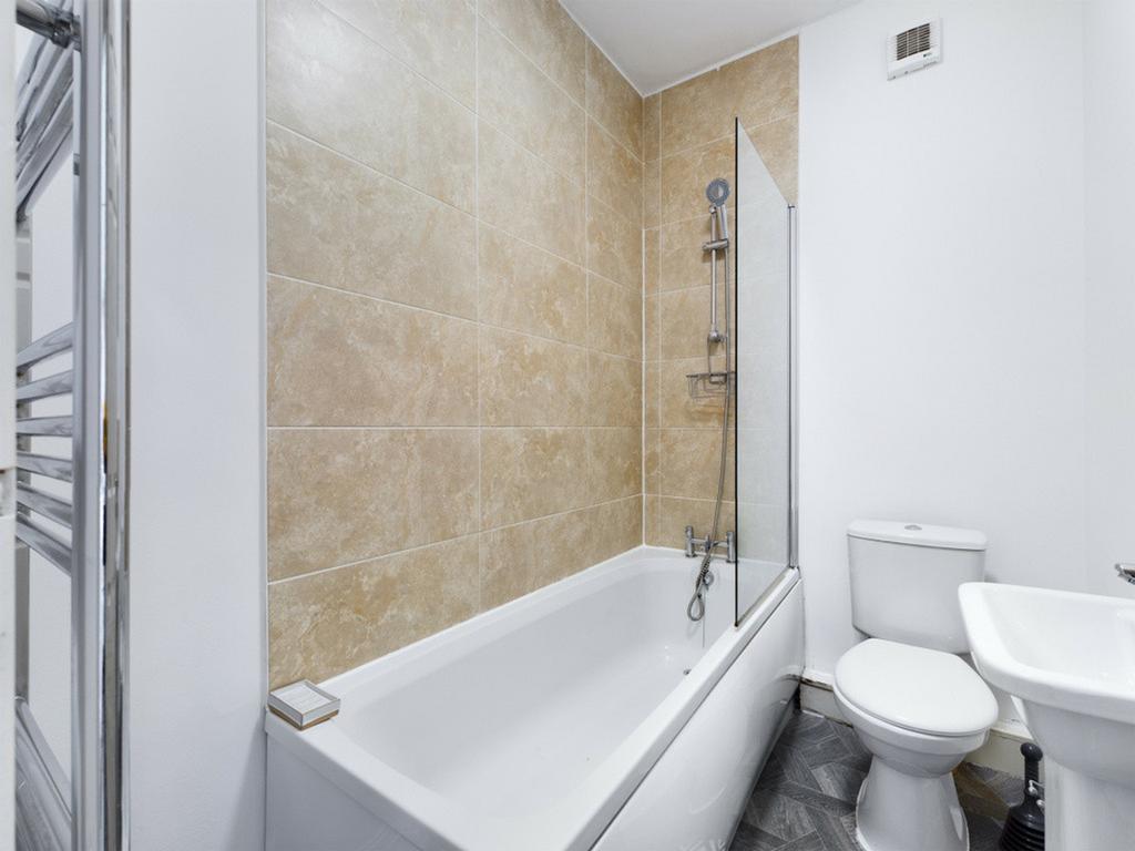 A modern and well-maintained bathroom featuring...