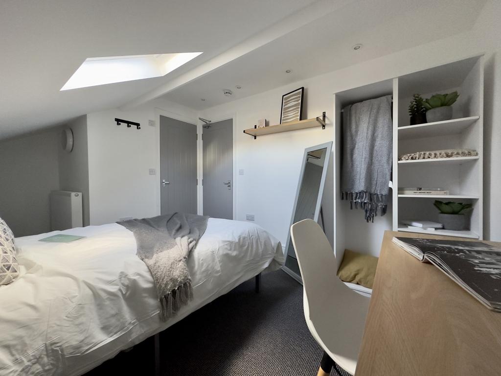 A spacious and inviting large double bedroom wi...