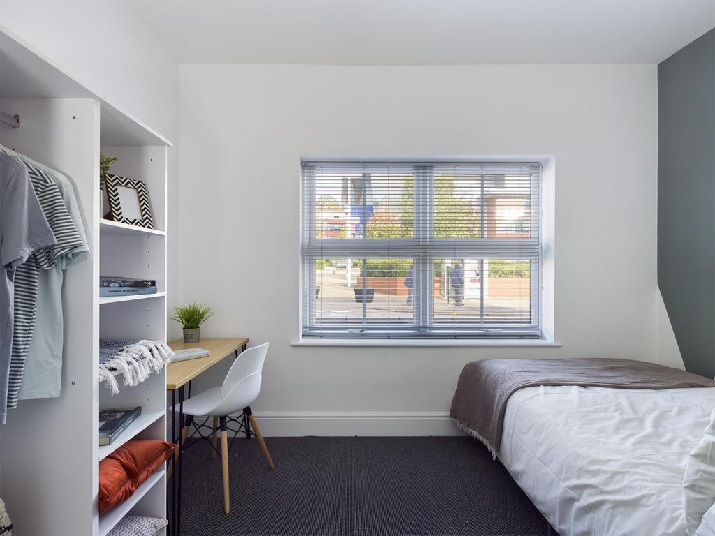Bright, neatly presented single bedroom with a ...