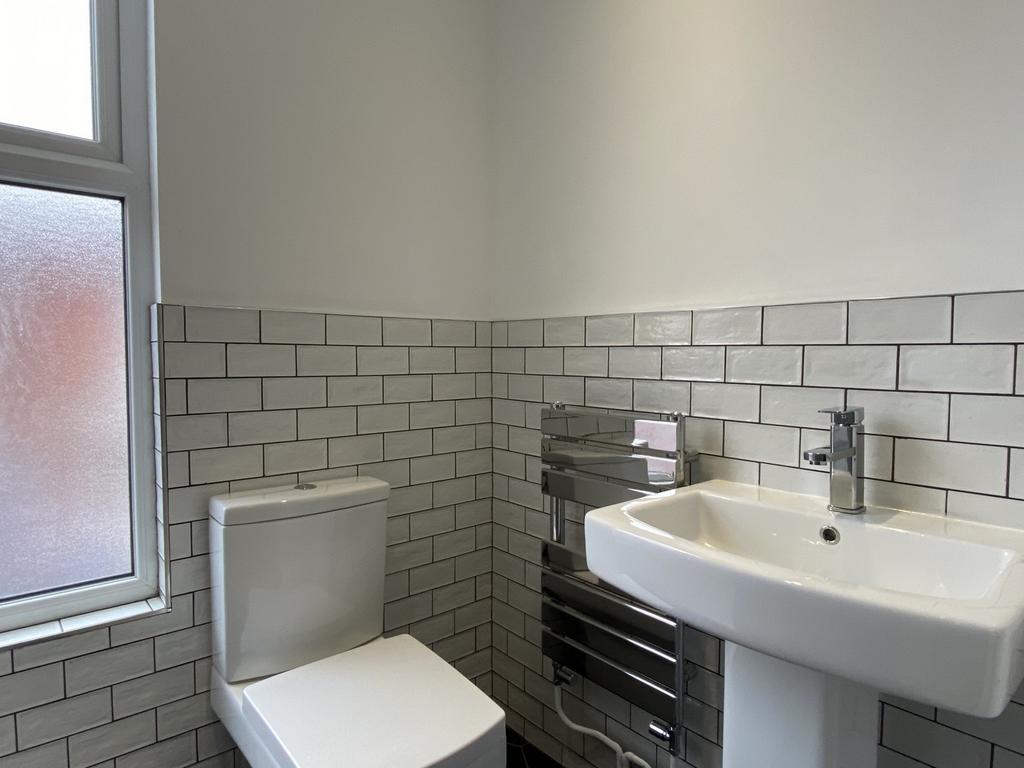 A modern and clean bathroom featuring stylish t...