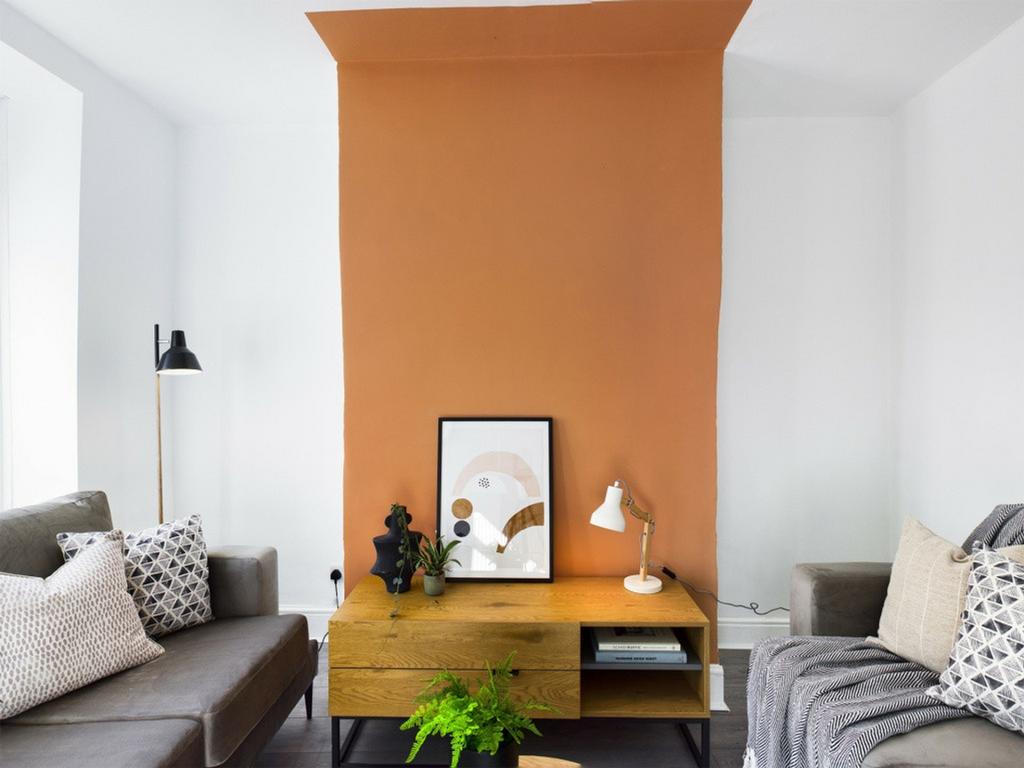 A stylish and inviting living room featuring mo...