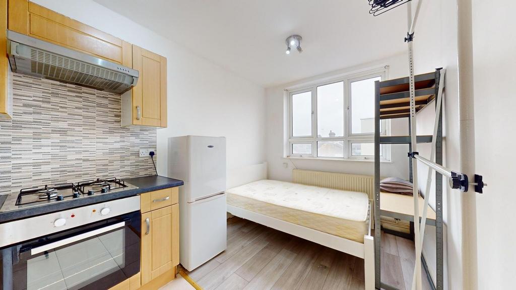 Bright and airy living space featuring large wi...