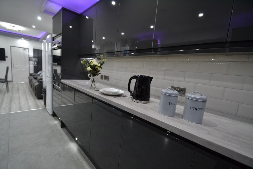 Modern and sleek kitchen equipped with a stylis...