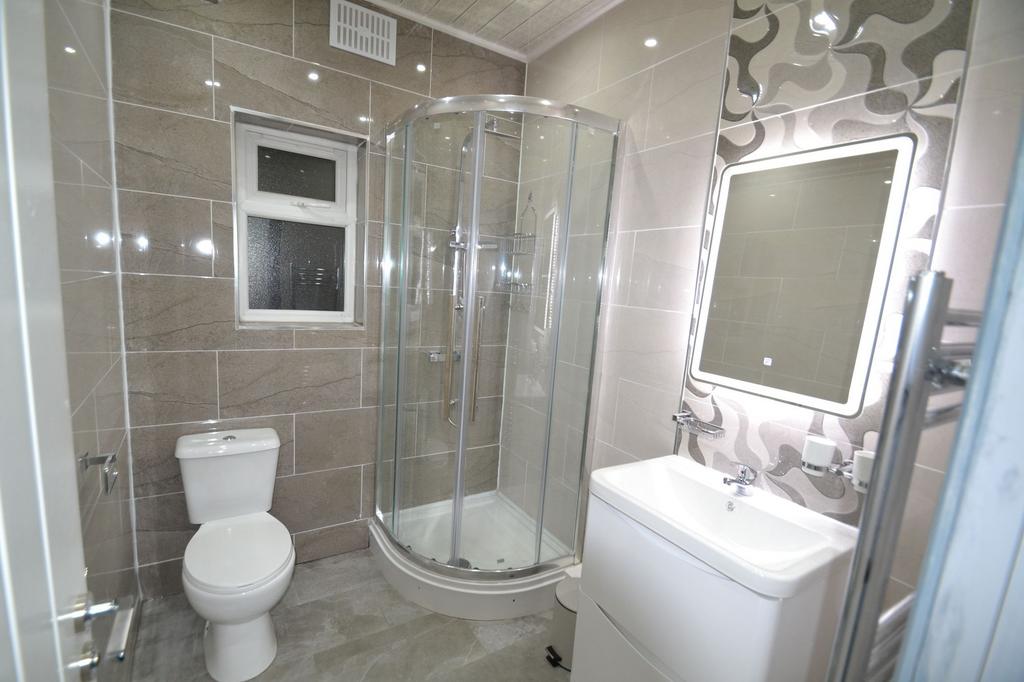 Modern bathroom featuring a compact space with ...