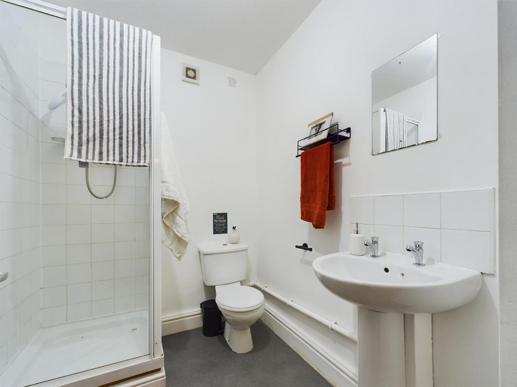 A clean and well-maintained bathroom featuring ...
