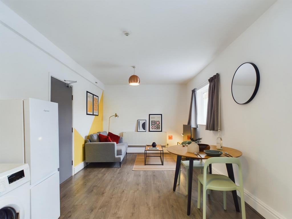 A spacious and stylish modern living room, perf...
