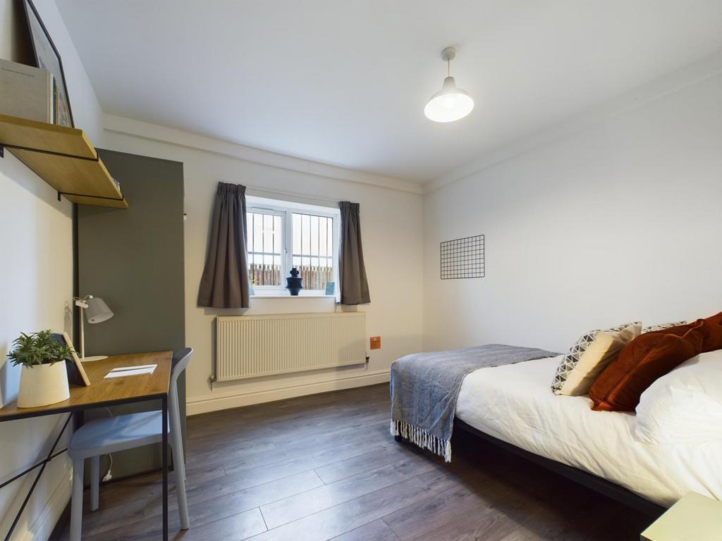 A bright and inviting double bedroom, perfect f...