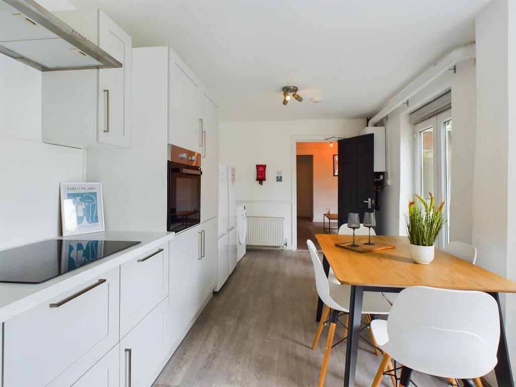 A modern and tidy kitchenette featuring stylish...
