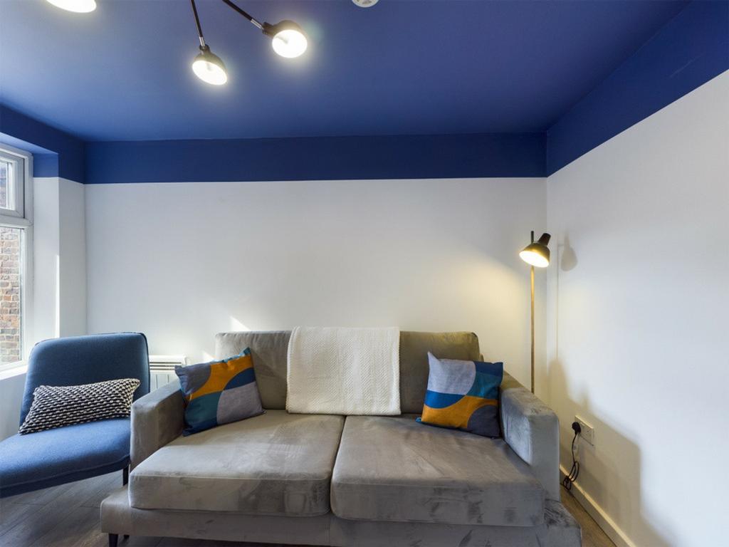A stylish and inviting living room featuring mo...