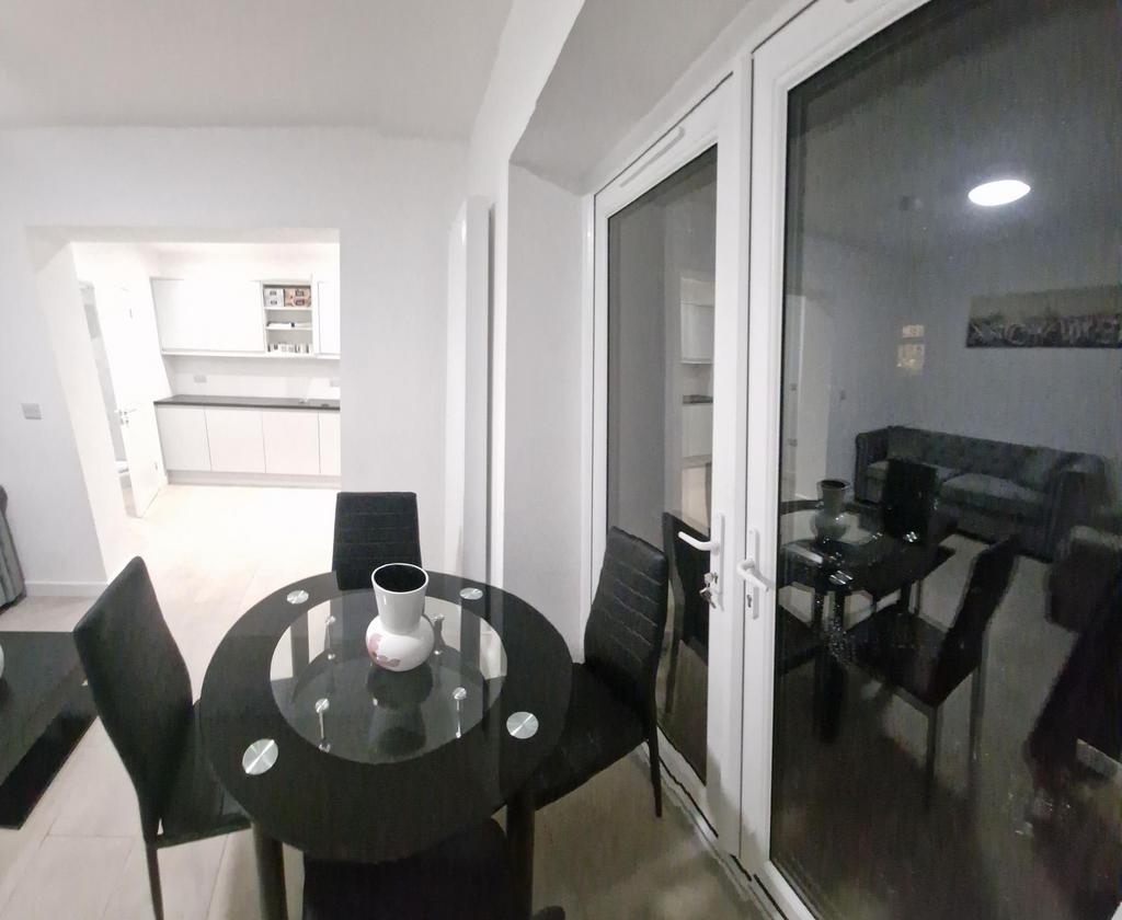 Bright open-plan living/dining area with a mode...