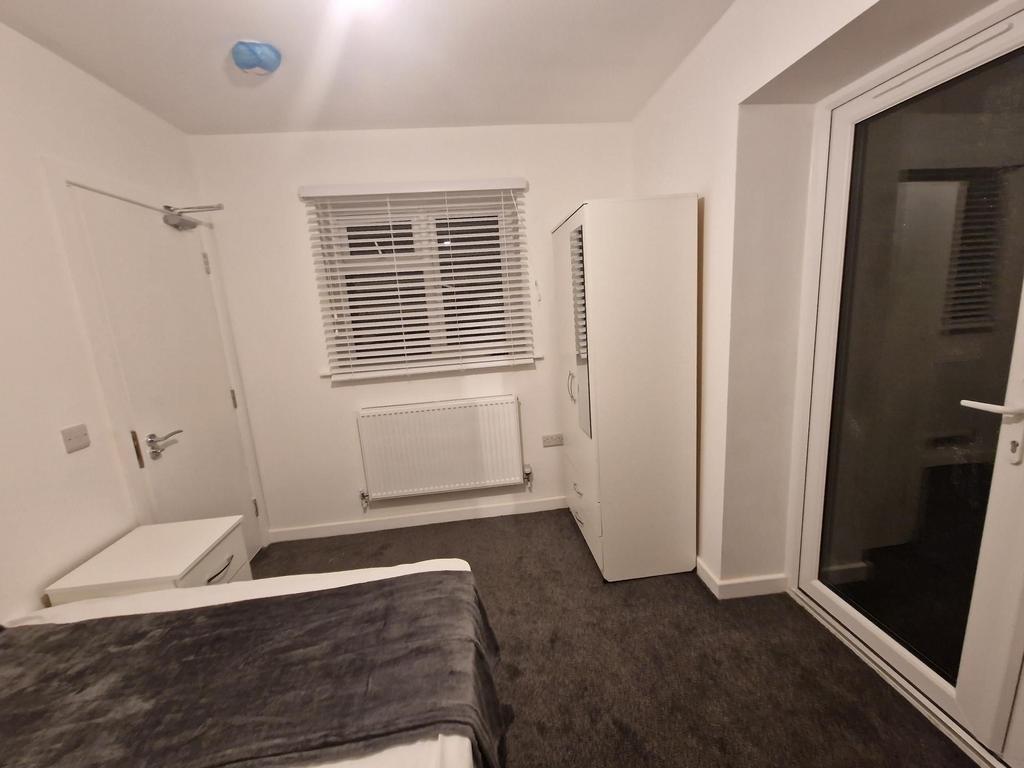 Bright, clean double bedroom with neutral decor...